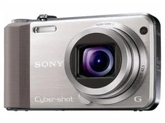 DFK SONY kompakt DSC-HX7VN, 16,1MPix, 10x zoom, 3" LCD, FullHD video, 3D, GPS, zlatý + baterie FG1